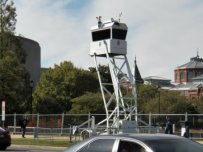 And of course, the ubiquitous surveillance tower, seen soon in a city near you